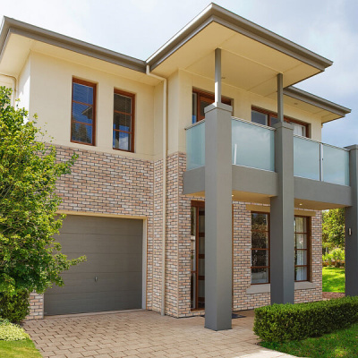 Фaсадная плитка Hauberk цвет Травертин на фасаде дома фото Фaсадная плитка Hauberk цвет Травертин на фасаде дома фото