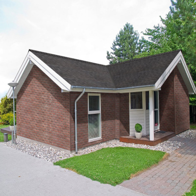 Фaсадная плитка Hauberk коллекция Кирпич цвет Обожженый на фасаде дома фото Фaсадная плитка Hauberk коллекция Кирпич цвет Обожженый на фасаде дома фото